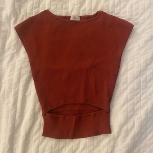 Aritzia Wilfred short sleeve top with slit in middle.
